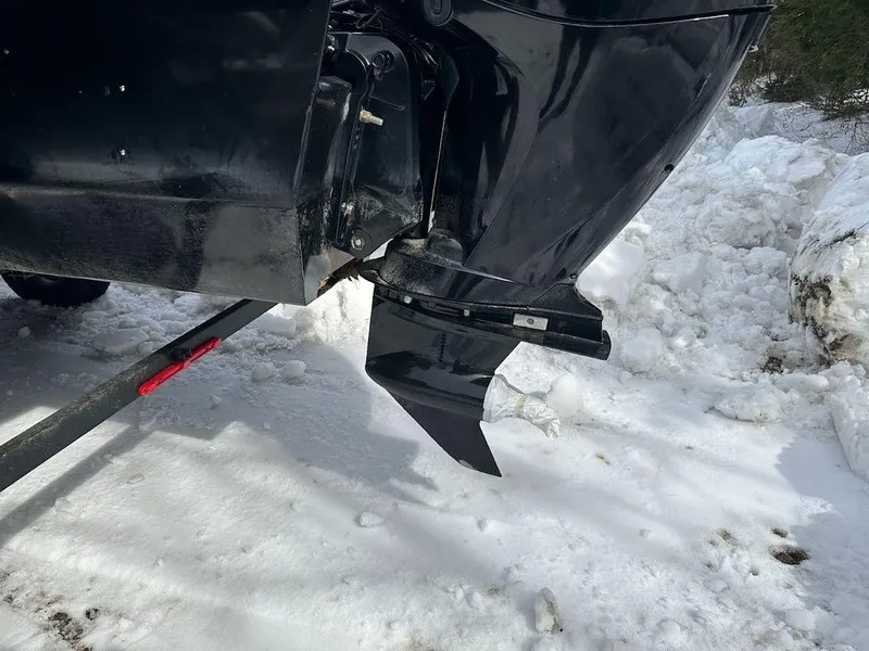 Slide: The Image of 2021 Ranger 243C boat motor in snowy outdoor setting. - 5