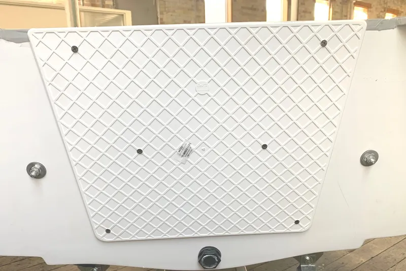 Slide: The Image of 2023 Walker Bay Supertender 325 Deluxe boat hull with textured white surface. - 3