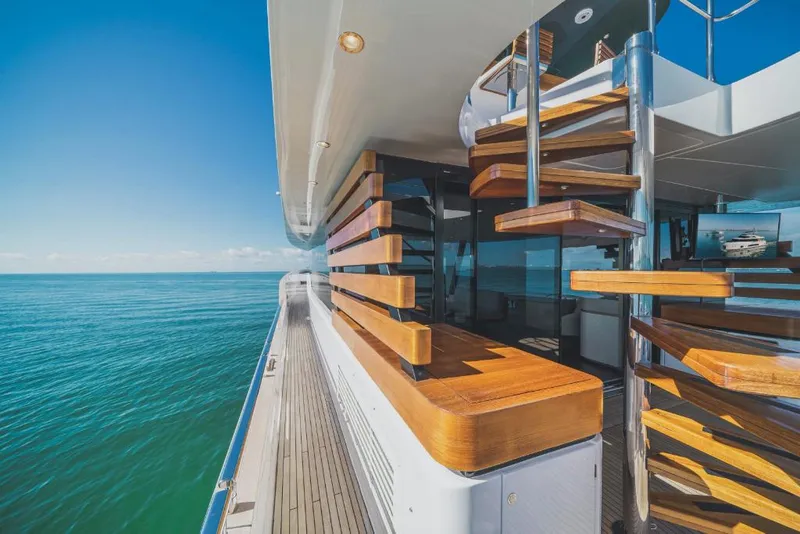 Slide: The Image of 2023 Azimut Magellano 25 Metri yacht with wooden spiral staircase and ocean view. - 24