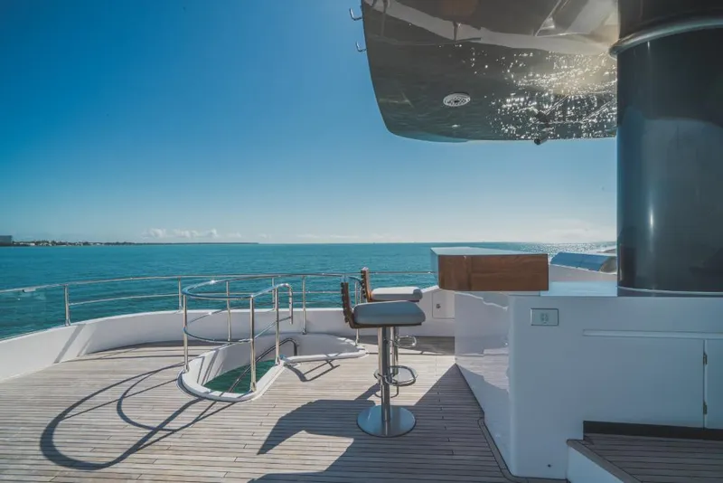 Slide: The Image of Azimut Magellano 25 Metri 2023 yacht deck with ocean view and seating area. - 35