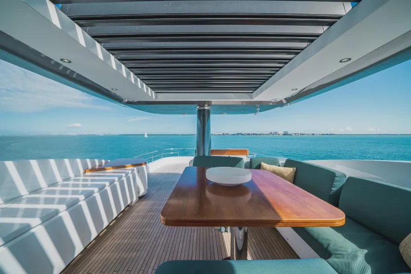 Slide: The Image of Azimut Magellano 25 Metri 2023 yacht deck with ocean view and seating area. - 40