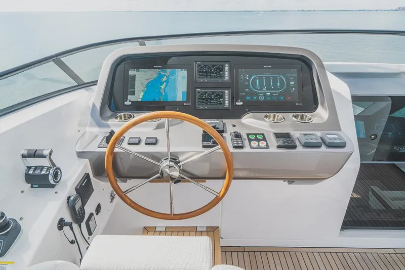 Slide: The Image of Helm station of 2023 Azimut Magellano 25 Metri yacht with advanced navigation systems. - 44