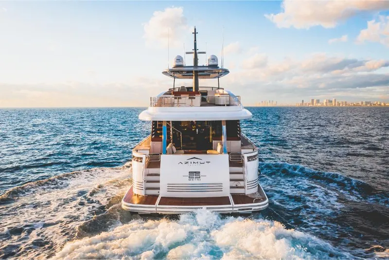 Slide: The Image of Azimut Magellano 25 Metri 2023 yacht cruising on open sea at sunset. - 5