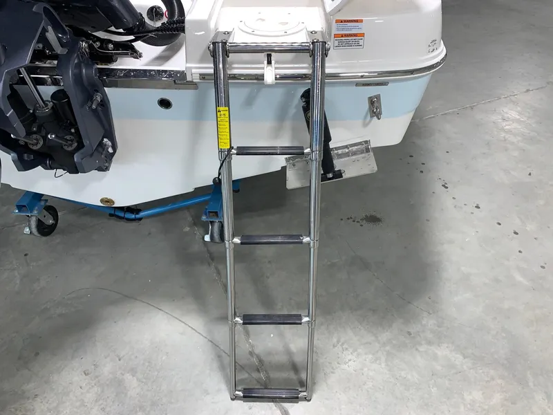 Slide: The Image of 2026 Robalo R222 Center Console boat with a stainless steel boarding ladder. - 5