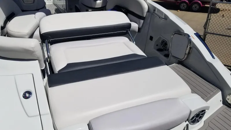 Slide: The Image of 2018 Crownline 275 SS boat interior with white and black seating. - 9