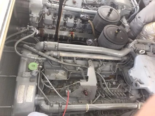 Slide: The Image of Engine of a 1997 Baia Cantieri boat, showcasing complex mechanical components. - 14