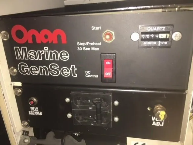 Slide: The Image of Onan Marine GenSet control panel on a 1997 Baia Cantieri boat. - 15