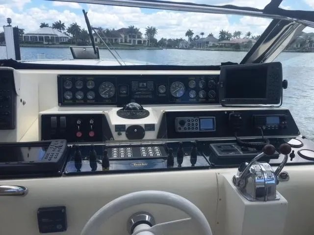 Slide: The Image of 1997 Baia Cantieri yacht dashboard with navigation instruments and controls. - 2