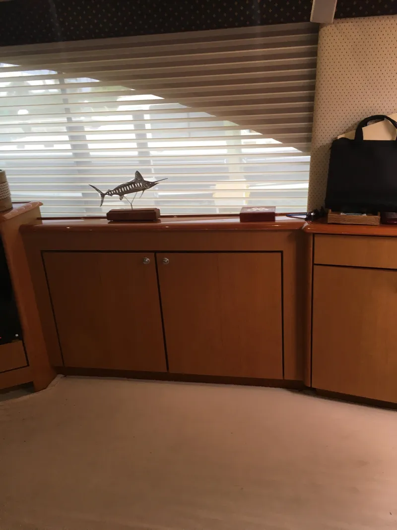 Slide: The Image of Interior of 2001 Ocean Yachts 56 Super Sport with wooden cabinets and decor. - 17