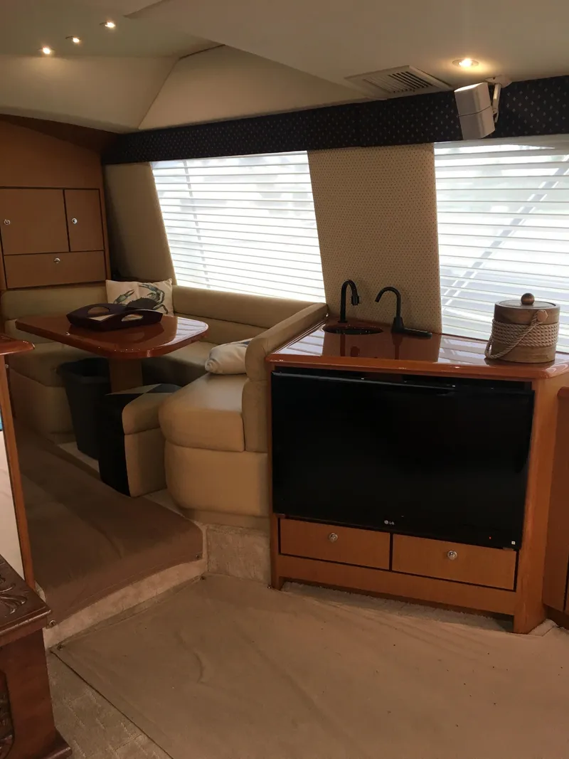 Slide: The Image of Interior of 2001 Ocean Yachts 56 Super Sport with seating and entertainment area. - 18