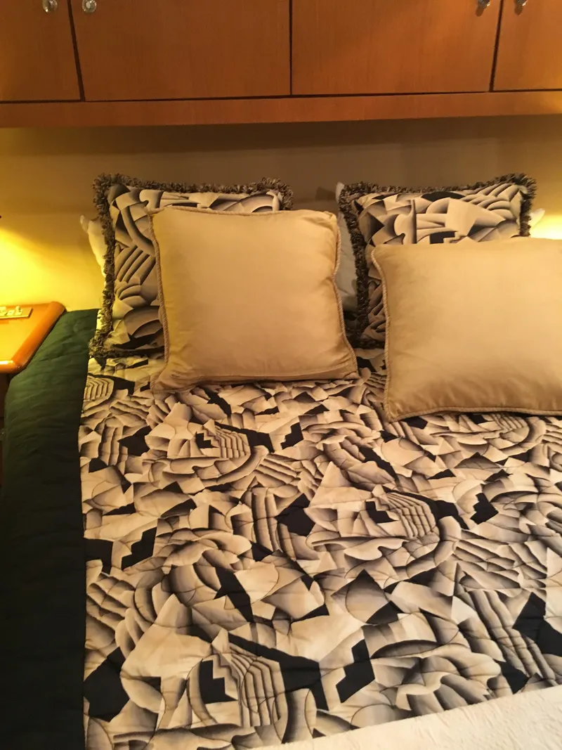 Slide: The Image of Luxurious bedroom interior on 2001 Ocean Yachts 56 Super Sport. - 23