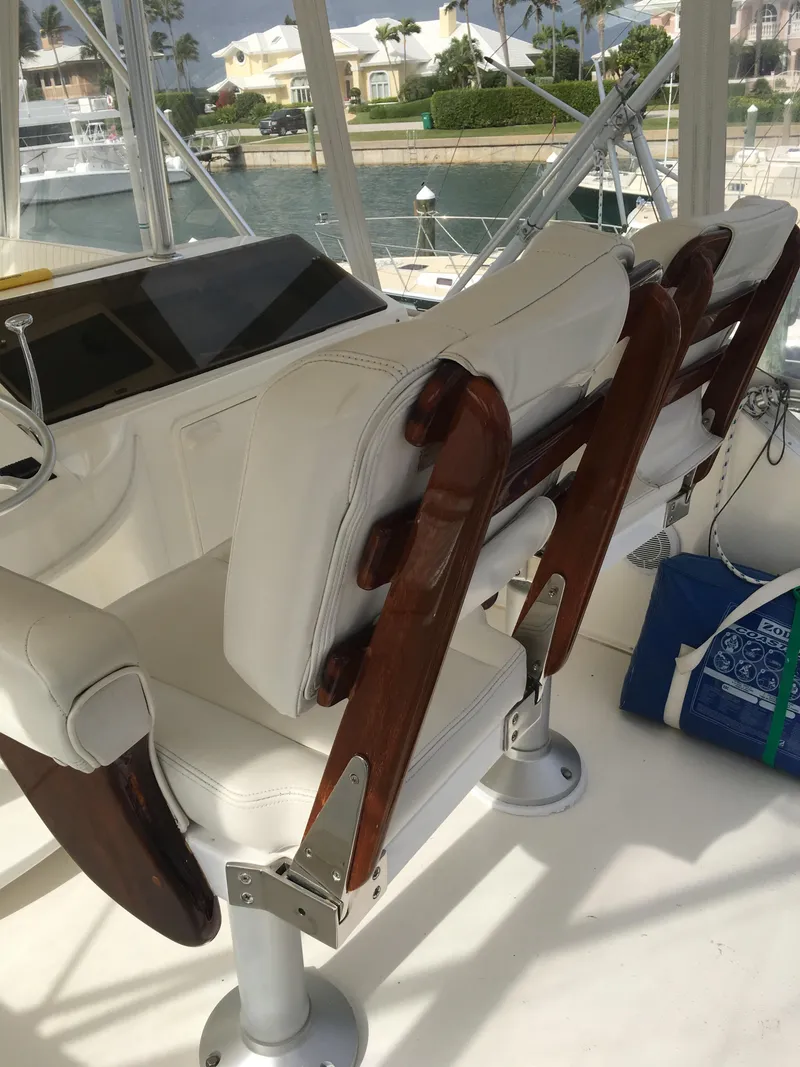 Slide: The Image of Luxury helm seats on 2001 Ocean Yachts 56 Super Sport boat. - 6