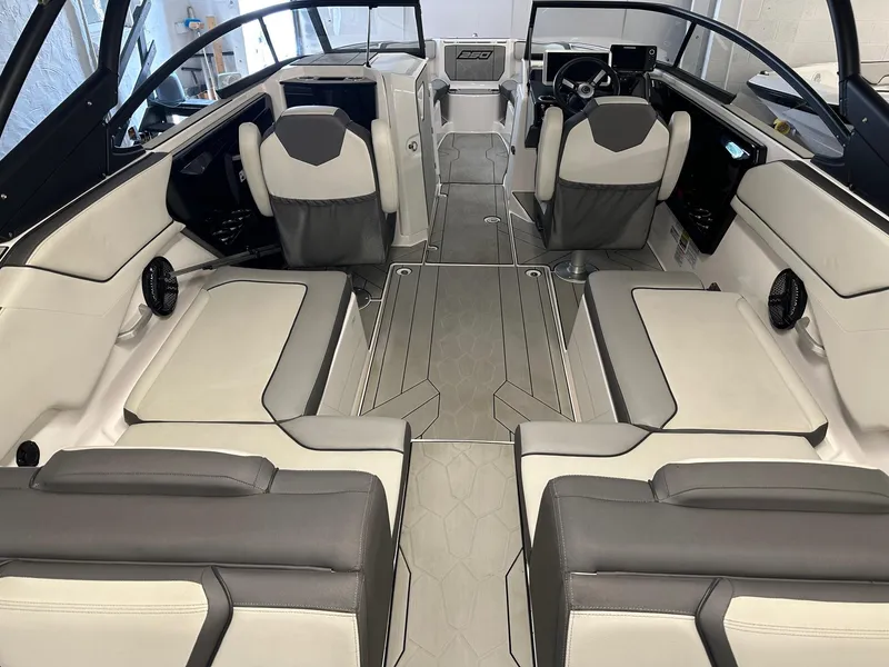 Slide: The Image of 2021 Yamaha Boats AR250 interior with modern seating and sleek design. - 5