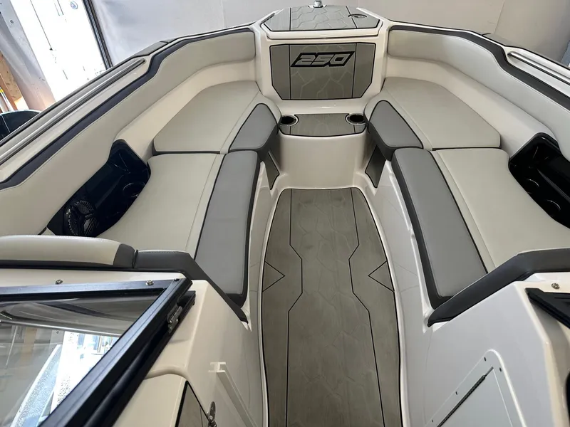 Slide: The Image of 2021 Yamaha AR250 boat interior with gray seating and modern design. - 7