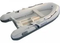The Image of 2025 Highfield Ultralite 290 PVC inflatable boat with oars, displayed upright. - 0
