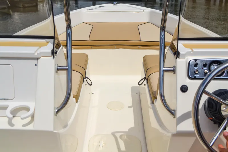 Slide: The Image of Interior of 2026 Scout 175 Sport Dorado with beige seating. - 11