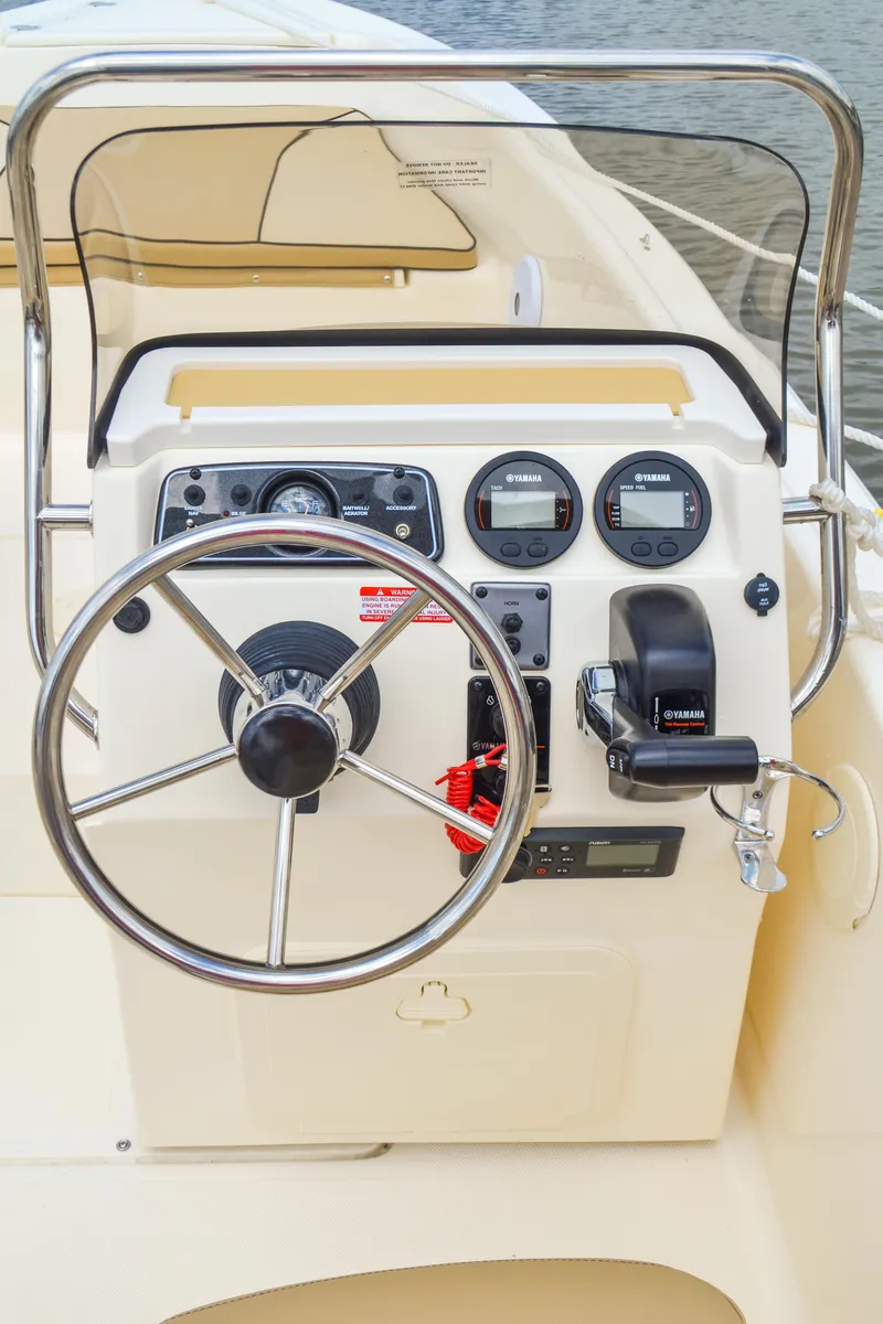 Slide: The Image of 2026 Scout 175 Sport Dorado helm with instruments. - 13