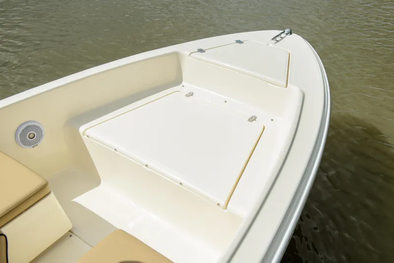 Slide: The Image of Scout 175 Sport Dorado 2026 boat bow deck on water. - 15
