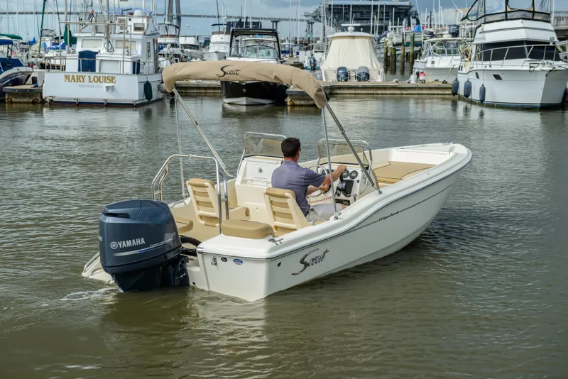 Slide: The Image of Scout 175 Sport Dorado 2026 in harbor with Yamaha engine. - 18