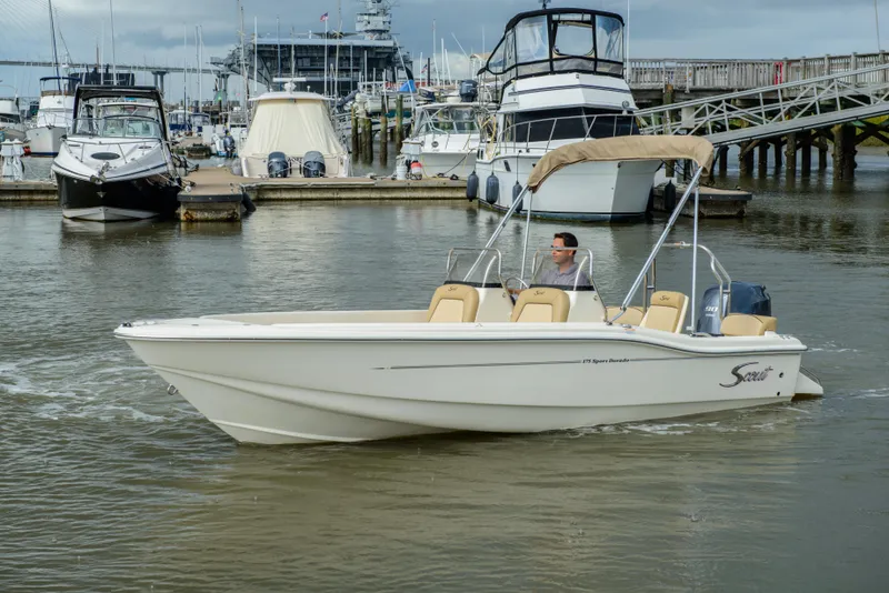 Slide: The Image of 2026 Scout 175 Sport Dorado boat in harbor. - 20