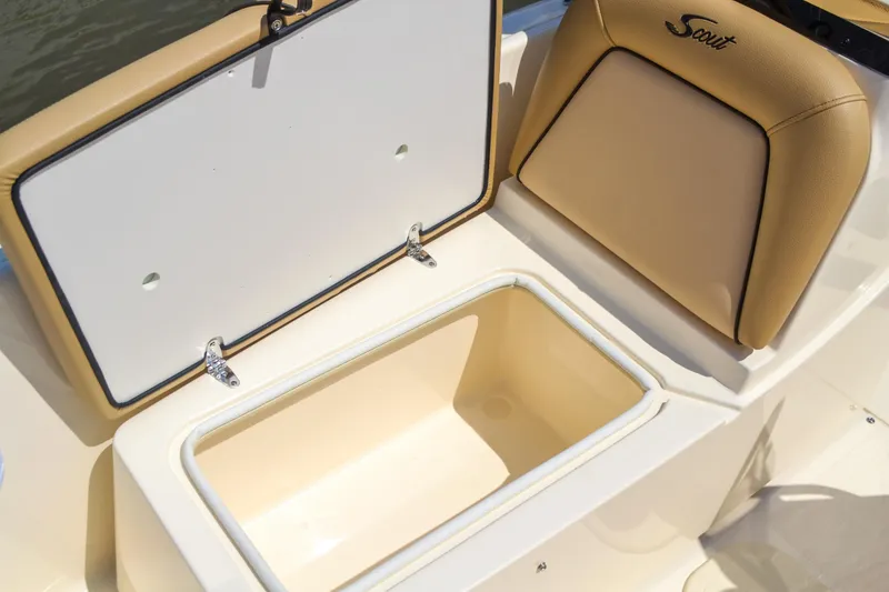 Slide: The Image of 2026 Scout 175 Sport Dorado seat with storage compartment. - 8