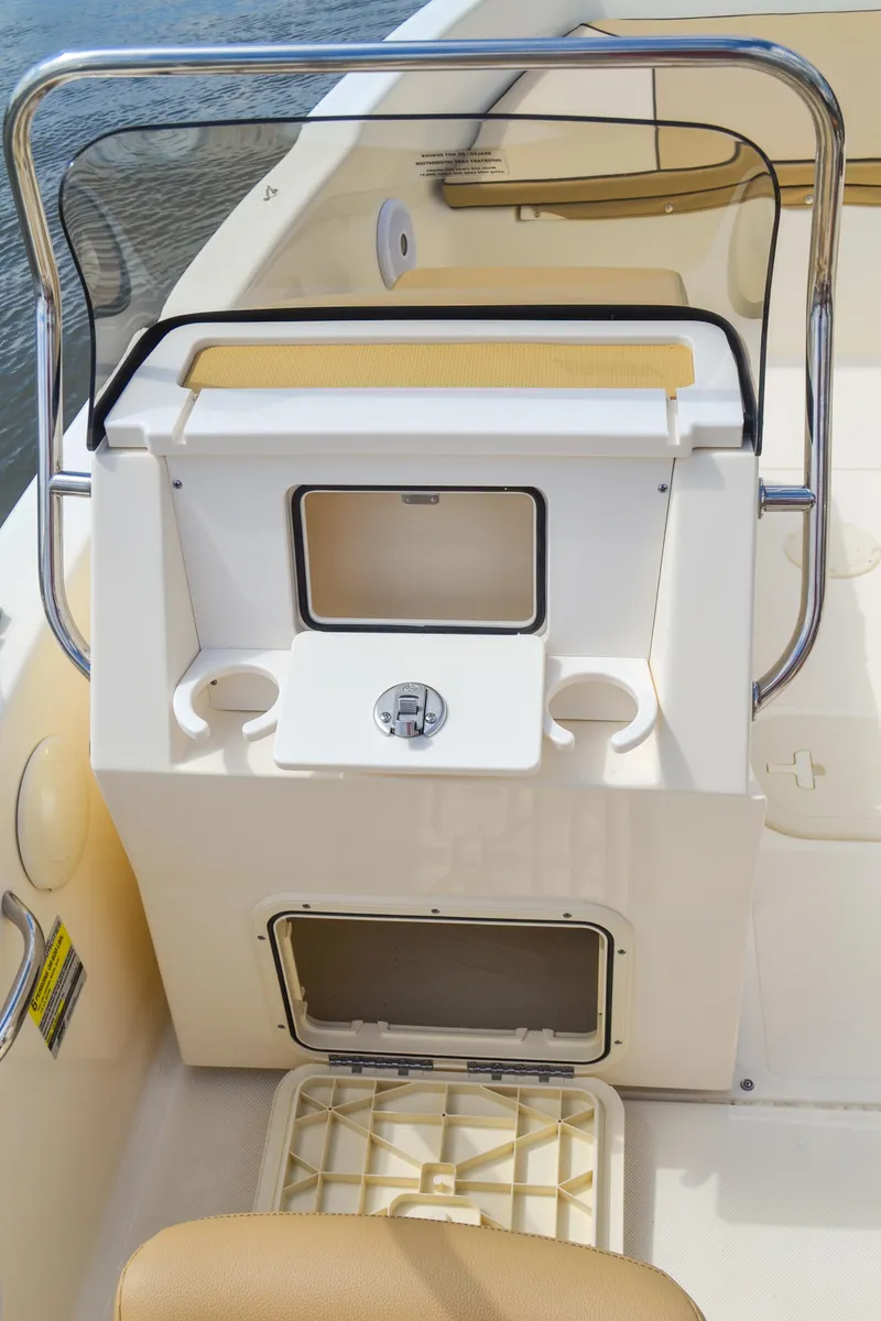 Slide: The Image of 2026 Scout 175 Sport Dorado console with cup holders. - 9