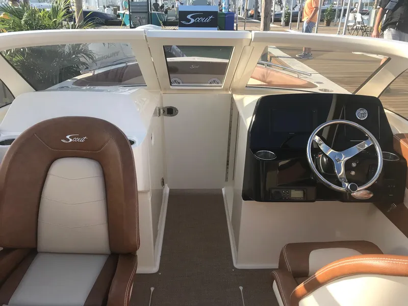 Slide: The Image of Interior of 2026 Scout 240 Dorado with steering wheel and seats. - 4