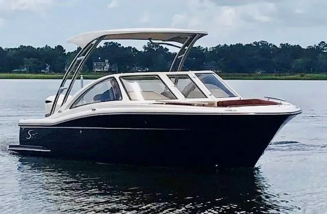 Slide: The Image of Scout 240 Dorado 2026 on calm water. - 41