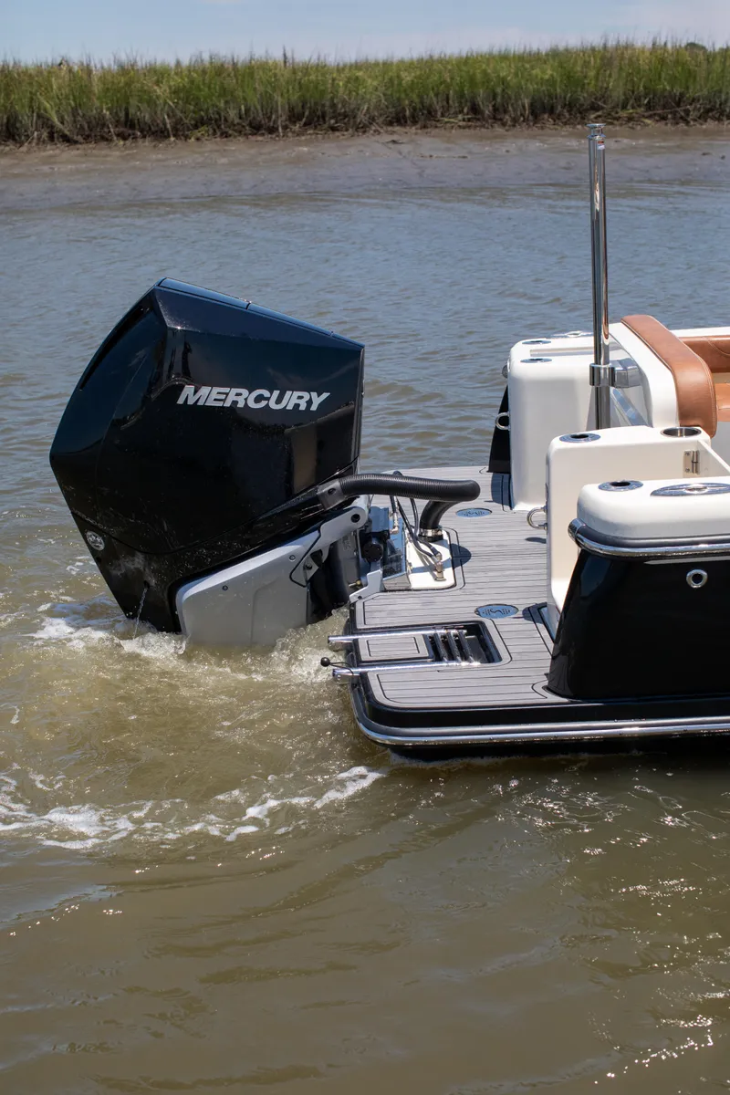 Slide: The Image of Scout 240 Dorado 2026 with Mercury engine in water. - 7