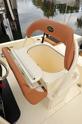 Slide: The Image of Scout 251XSS 2025 boat seat with brown upholstery. - 4