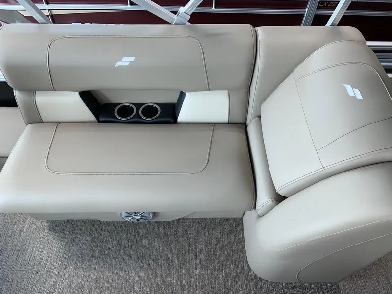 Slide: The Image of 2024 Starcraft LX20 F boat beige seating with cup holders. - 15