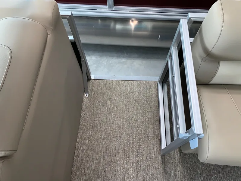Slide: The Image of 2024 Starcraft LX20 F interior seating and gate detail. - 6
