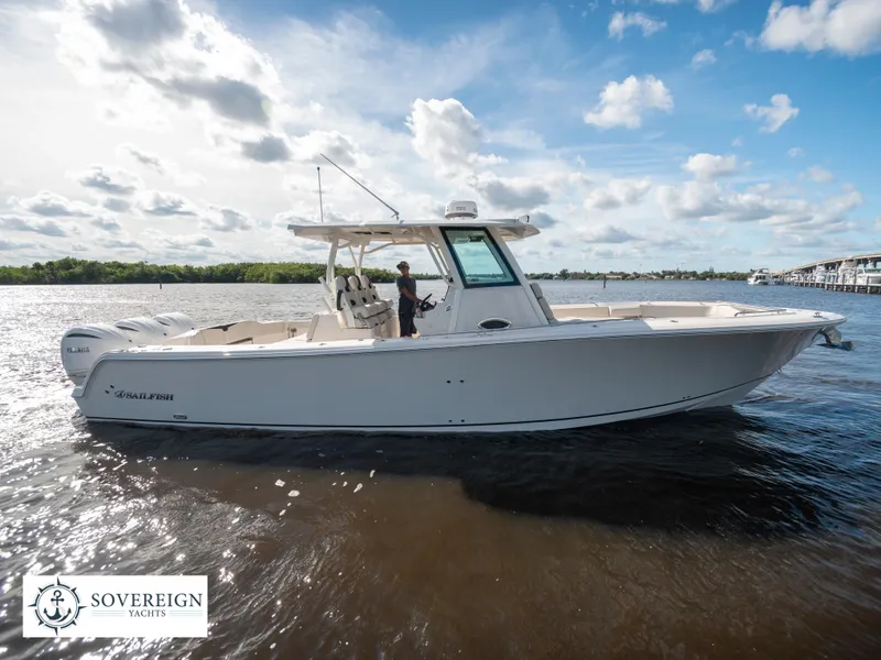 Slide: The Image of 2024 Sailfish 360 CC boat on water, Sovereign Yachts logo. - 28