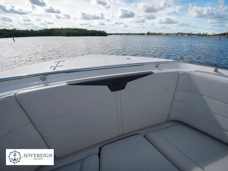 Slide: The Image of 2024 Sailfish 360 CC boat bow seating with scenic water view. - 36