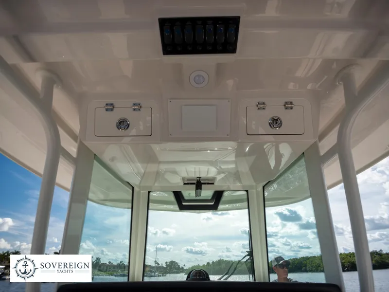 Slide: The Image of Interior view of 2024 Sailfish 360 CC boat with Sovereign Yachts logo. - 41