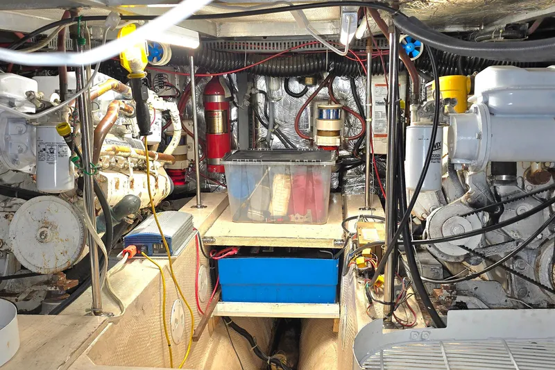 Slide: The Image of Engine room of 1989 Carver 42 Aft Cabin Motor Yacht, showcasing mechanical components. - 15