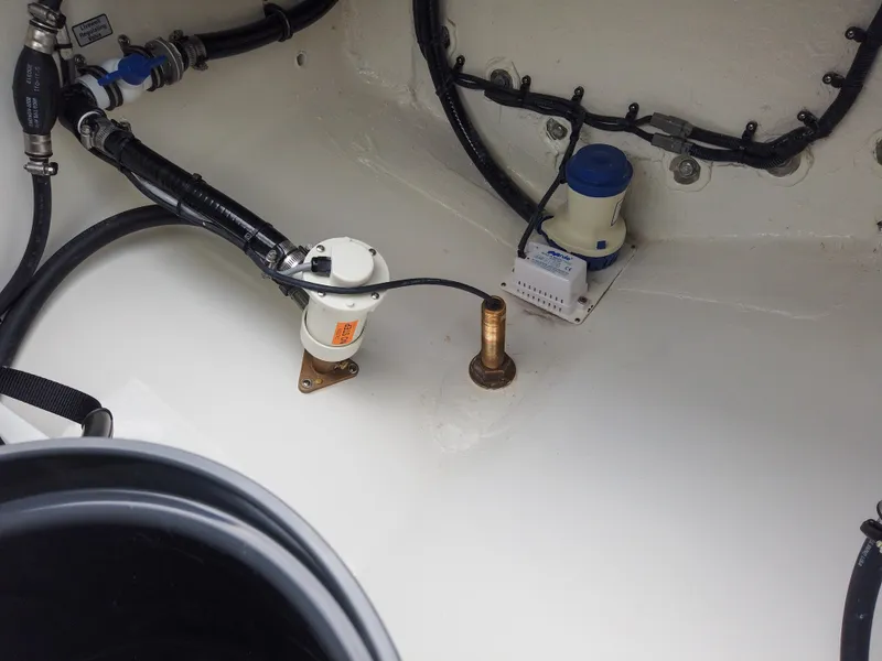 Slide: The Image of 2023 Regulator 28 boat wiring and plumbing components. - 14