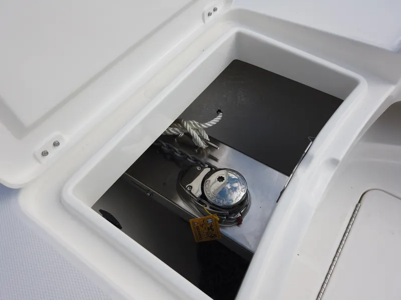 Slide: The Image of Anchor storage compartment on a 2023 Regulator 28 boat. - 28