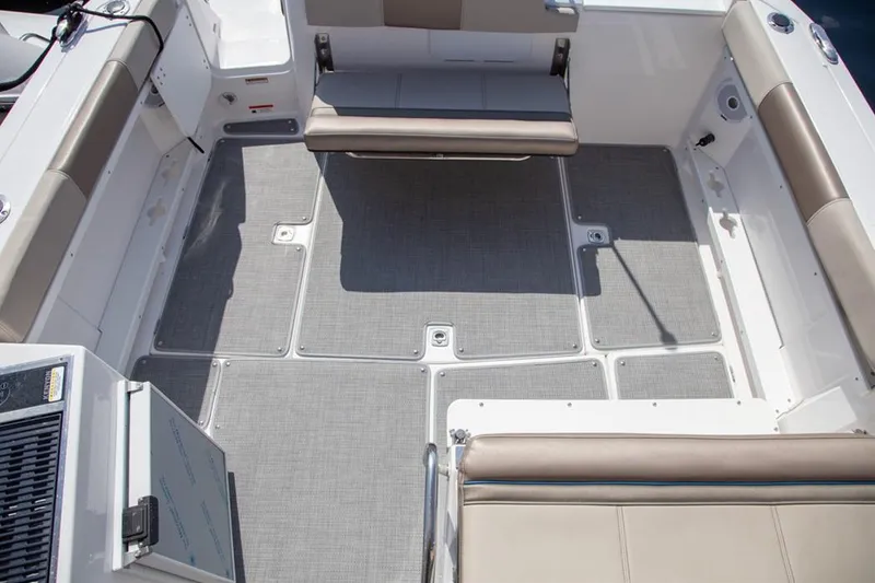 Slide: The Image of 2020 Cutwater 24 DC boat interior with spacious seating and modern design. - 18