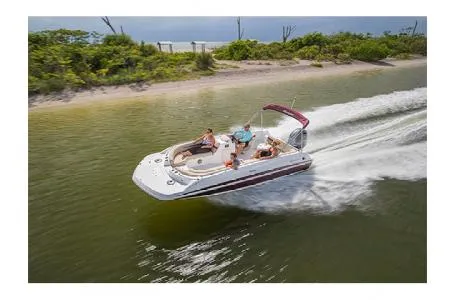 Slide: The Image of 2017 Hurricane SS 201 boat cruising on a scenic waterway near lush greenery. - 12