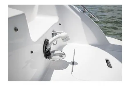 Slide: The Image of 2017 Hurricane SS 201 boat detail, featuring a sleek white deck and water backdrop. - 6