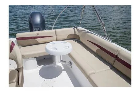 Slide: The Image of 2017 Hurricane SS 201 boat interior with seating and table on water. - 8