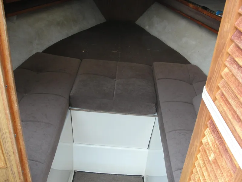 Slide: The Image of Interior cabin of 1987 Cobalt Condesa boat with cushioned seating. - 10