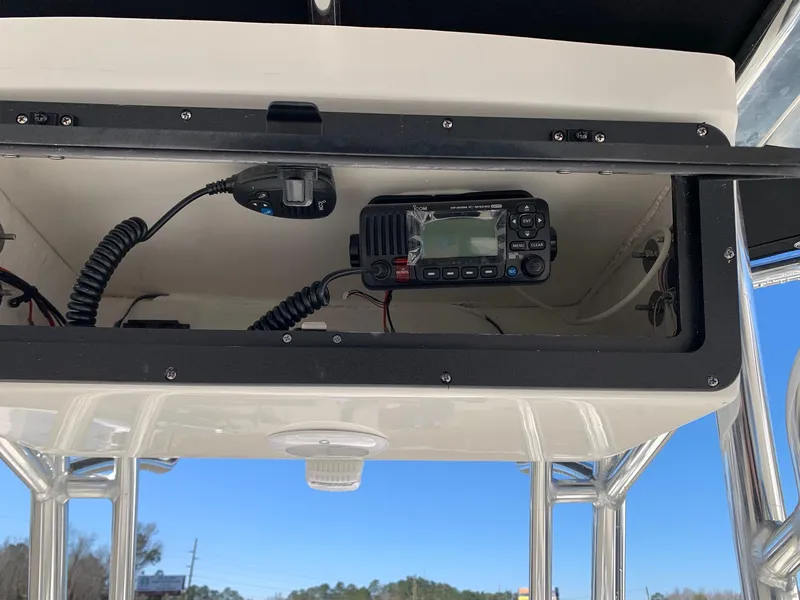 Slide: The Image of 2024 Key West 210 Bay Reef boat console with marine radio. - 10