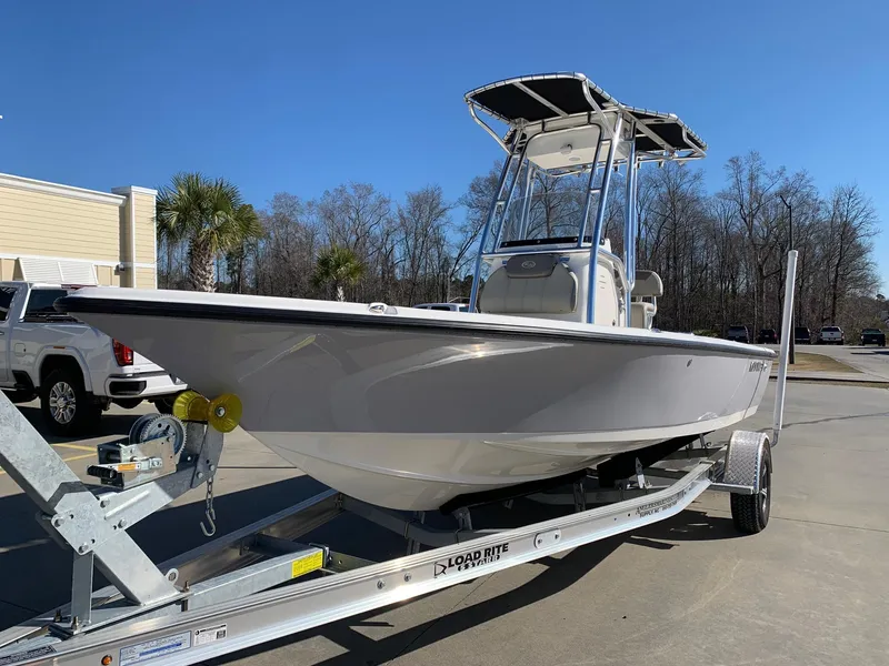 Slide: The Image of 2024 Key West 210 Bay Reef boat on a trailer, ready for transport. - 2