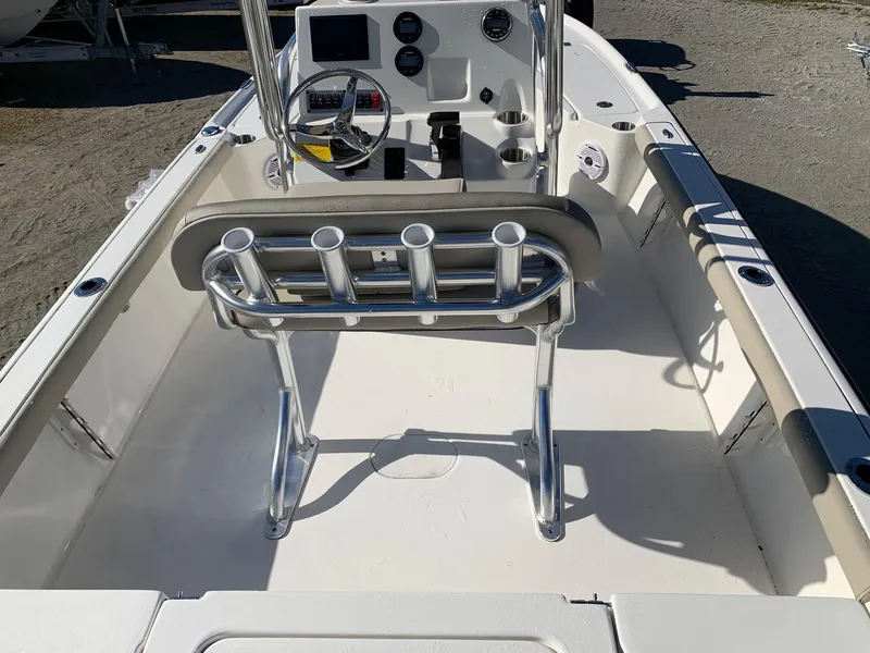 Slide: The Image of 2024 Key West 210 Bay Reef boat interior with console and rod holders. - 5