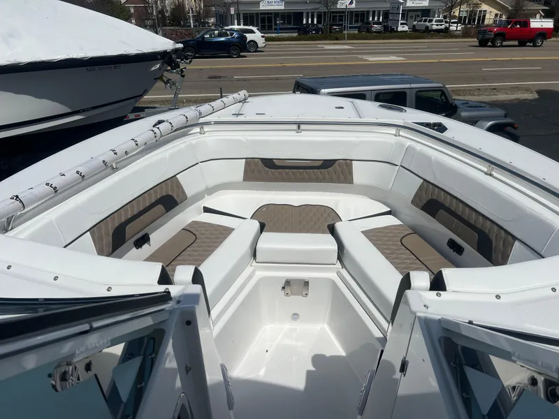 Slide: The Image of 2024 Blackfin 272DC boat with spacious seating area and modern design. - 22