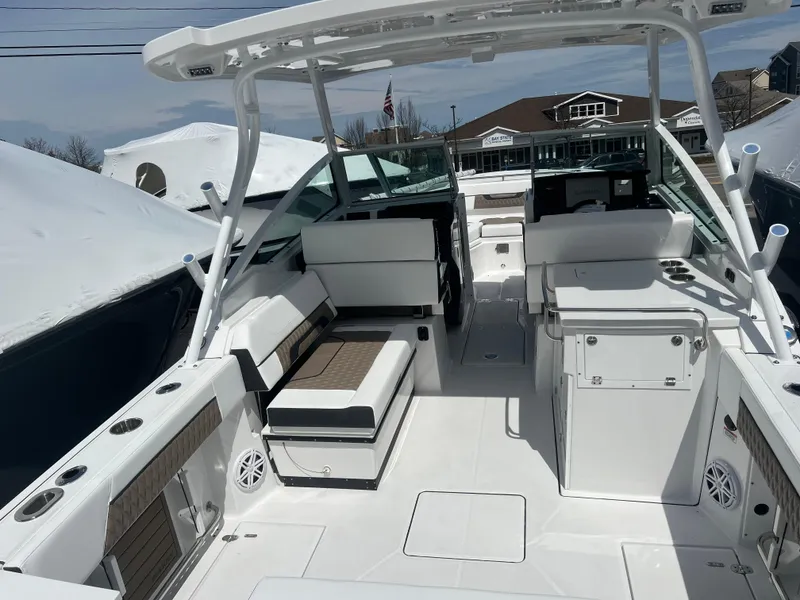 Slide: The Image of 2024 Blackfin 272DC boat interior with seating and storage compartments. - 6