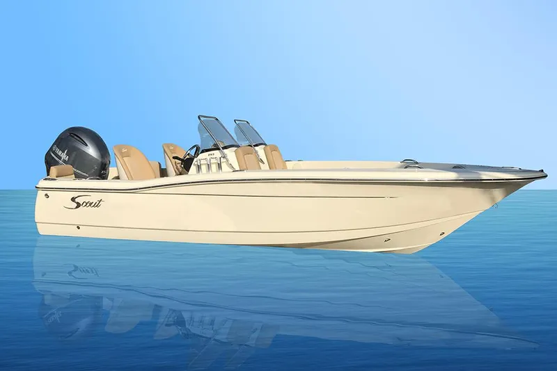 Slide: The Image of 2023 Scout 195 Sport Dorado boat on calm blue water. - 10