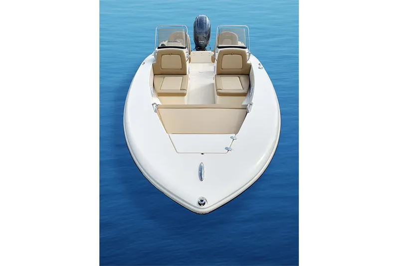 Slide: The Image of 2023 Scout 195 Sport Dorado boat on calm blue water. - 11